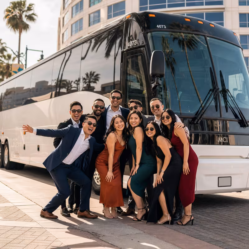 Passengers loading luggage while boarding an Anaheim group shuttle