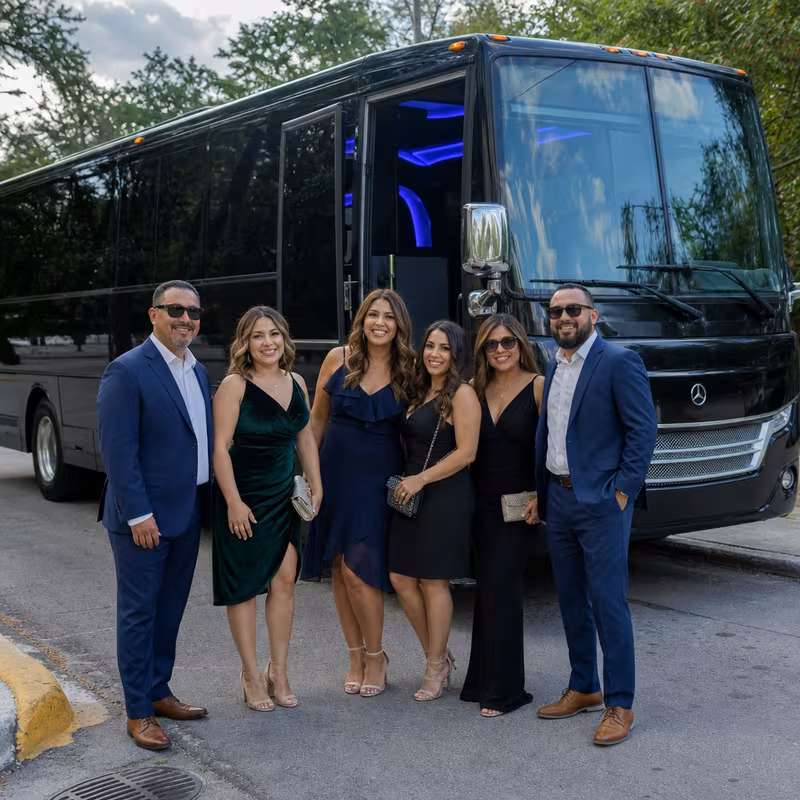 Passengers loading luggage while boarding an Anaheim group shuttle
