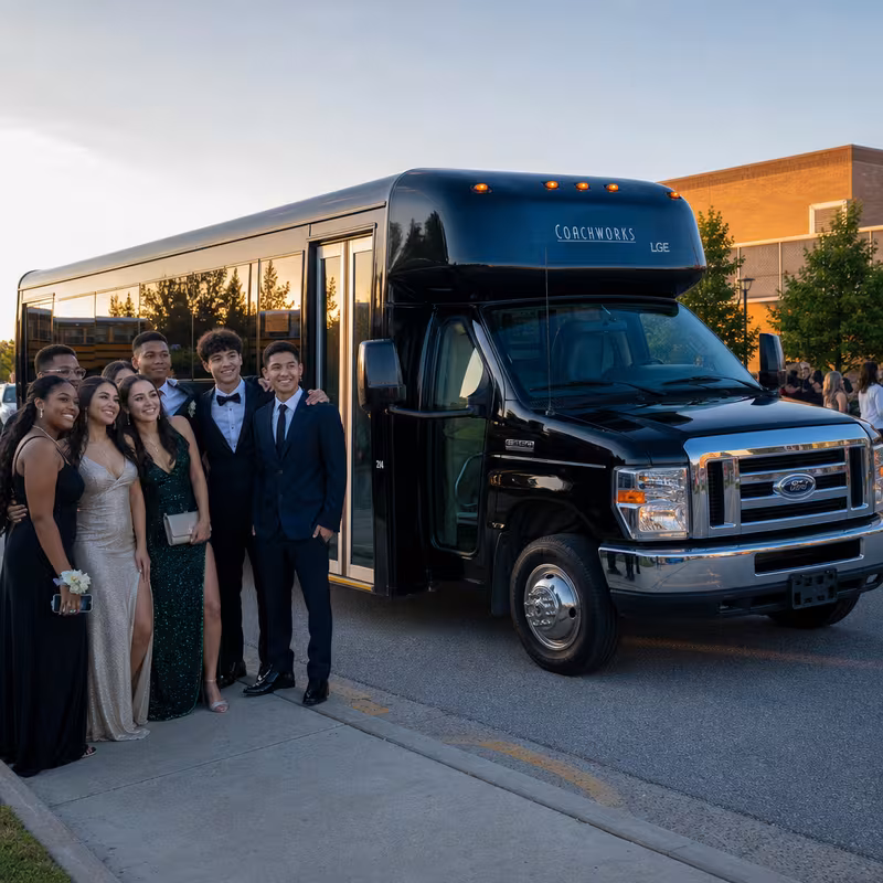 Group boarding a white charter bus for Prom & Homecoming Transportation transportation in Anaheim