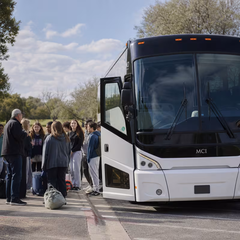 Black Mercedes Sprinter van staged for an Anaheim School Transportation group