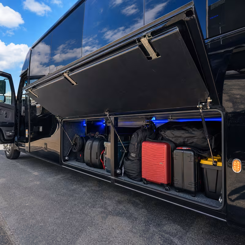 Party bus interior with wraparound leather seating and LED lighting in Anaheim